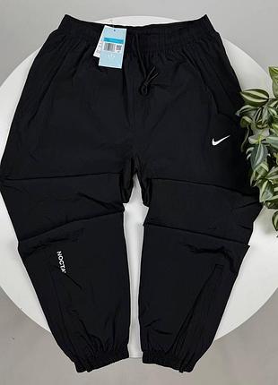 Нейлоновые брюки nike notta черные