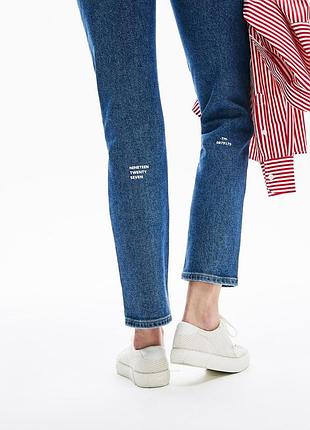 Джинси lacoste