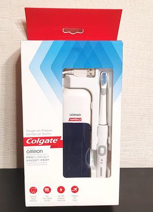 Електронна зубна щітка colgate
