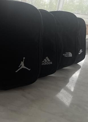 Сумки через плече  «nike, adidas, ston island, jordan,the north face»чорного кольору.
