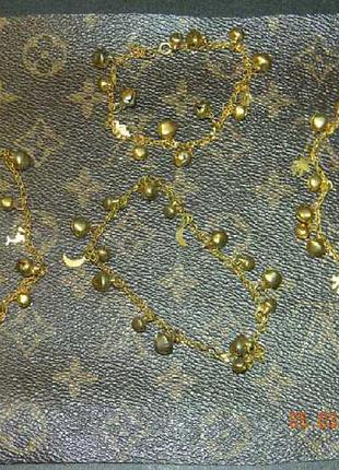 Легкие металлические браслеты золотого цвета громко звенят 4шт