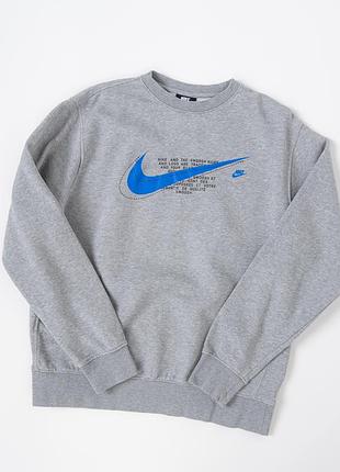Стильний світшот nike у класичному, сірому кольорі — універсальна базова річ для щоденного гардеробу. модель виконана з м’якого та приємного до тіла