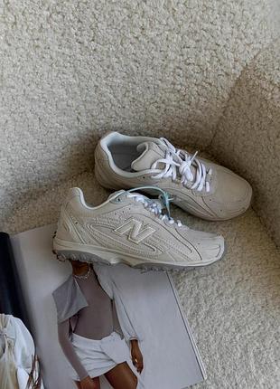 Кросівки new balance 204l beige