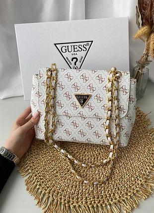 Кожаная сумка с ручками цепями guess женская сумка кросс боди от гесс сумочка для женщины 25х17х7 см белая