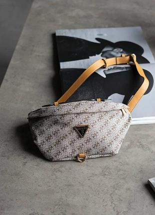 Женская бананка 33×17×12 см из кожи от guess кожаная поясная сумка гесс для женщины городская сумочка на пояс