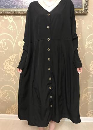 Очень красивое и стильное брендовое длинное платье чёрного цвета.2 фото