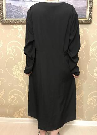 Очень красивое и стильное брендовое длинное платье чёрного цвета.3 фото
