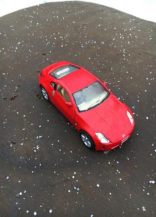 Іграшка залізна машинка дверей відчиняються kinsmart nissan 350z ідеал