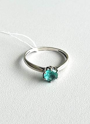 Серебряное кольцо 18.5 с голубым цирконием в цветке, 925 проба, вес 1.5 г