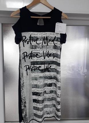 Bigshirt
36/s/44
38/м /46
женское черное платье с короткими рукавами и характерными выражениями на плечах
новая с биркой
