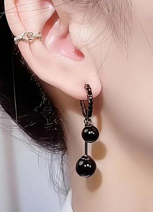 Изысканные черные серьги