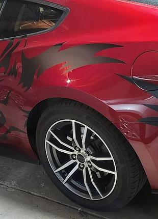 Вінілові наклейки на авто " самотній вовк " 50х130 см 2 шт