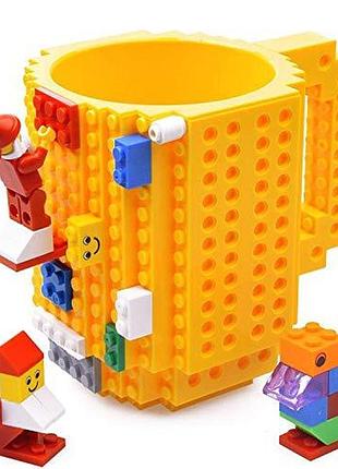 Конструктор лего чашка lego + фигурка динозавр жовтий