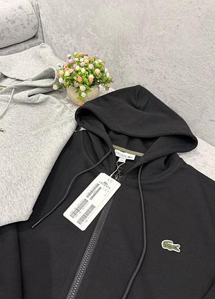 Зипка от бренда lacoste 9