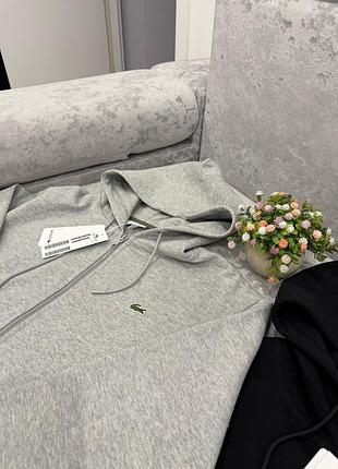 Зипка от бренда lacoste 10