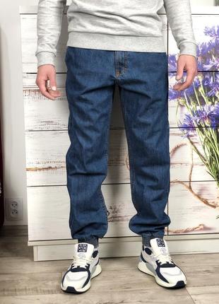 Об'ємні джинси на манжетах, застібка блискавка2 фото