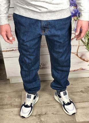 Об'ємні джинси на манжетах, застібка блискавка3 фото