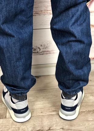 Об'ємні джинси на манжетах, застібка блискавка7 фото
