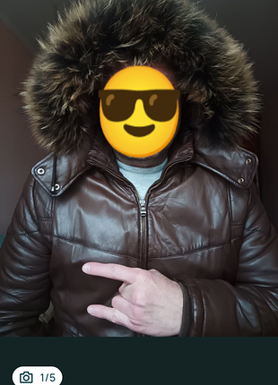 Продам кожаную куртку. шапка в подарок.