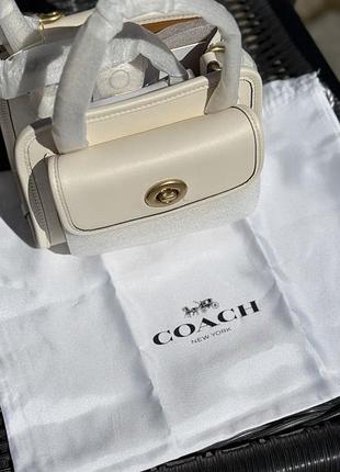 Біла оригінальна сумка coach