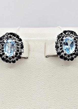 Сережки серебряные с голубым топазом и сапфирами 5,66 г