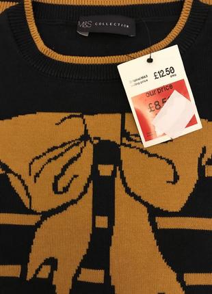 Нереально красивый и стильный брендовый свитерок в полоску.3 фото