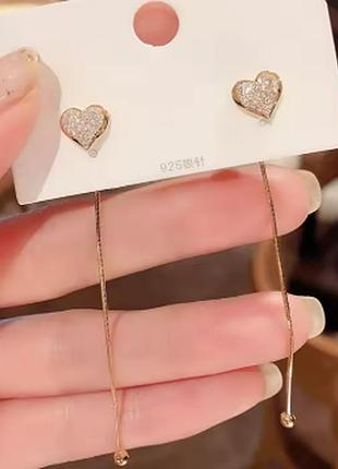 Золотистые серьги плесени с сердечками