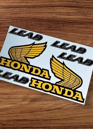 Жовті наклейки на мотоцикл-мопед скутер ліад lead honda хонda з крилами