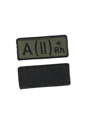 Нашивка группа крови 2+, военный / армейский шеврон всу, на оливке. 2,5 см * 6 см