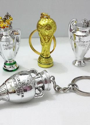 Фанатский комплект брелок - кубок лиги чемпионов, кубок чемпионата мира, кубок чемпион
