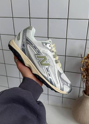 Женские кроссовки new balance 204l white beige metallic консульт белого с бежевым и серебристым цветов