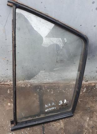 Скло лівих задніх дверей глухе opel kadett опель кадет хетчбек