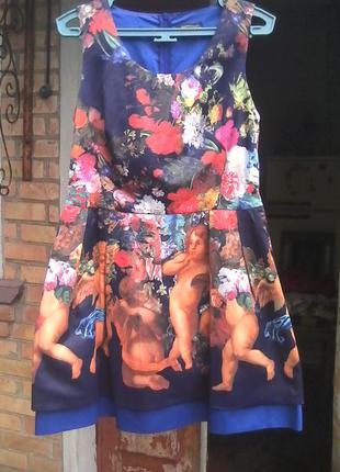 Неимоверно красивое платье,отличная ткань,оригинальный рисунок.