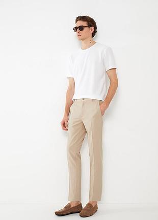 Брюки slim fit.