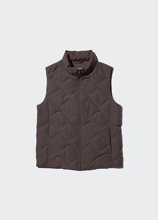 Злегка подовжена жилетка жилет  uniqlo pufftech seamless vest