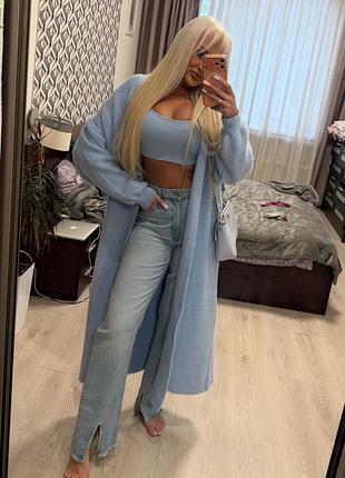 Женские джинсы с разрезами внизу
