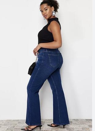 Новые.темно-синие джинсы клеш plus size с высокой посадкой