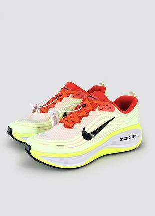 Nike vomero plus "orange volt"