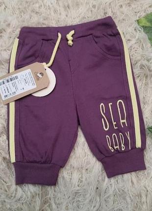 Фіолетові шорти з написом для дівчинки