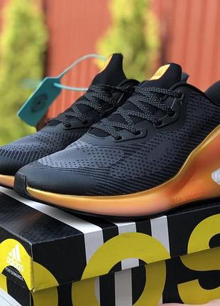 Adidas alphaboost чорні з помаранчевим