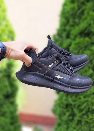 Reebok zig never say never черные с оранжевым