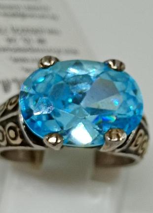 Серебряная кольца с голубым фианитом.