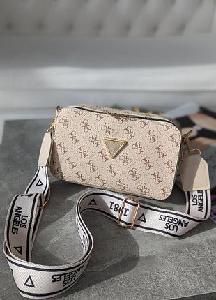 Сумочка guess кросс-боди мини лого молочный е