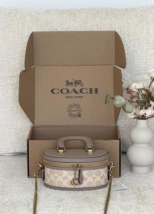 Сумка coach trail crossbody 17 молочно-бежевий є