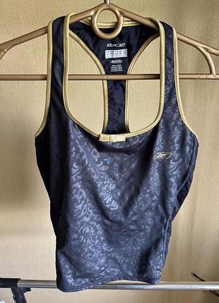 Женская спортивная майка бренда reebok из линейки playdry
