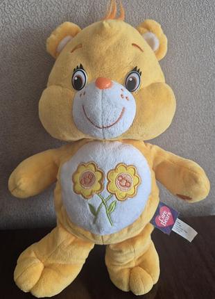 Ведмедик care bear дві квітки
