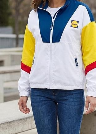 Спортивная ветровка crivit в стиле color block (унисекс) – акцент на модном многоцветном дизайне.