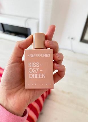 Kiss on cheek- 13 perfumes