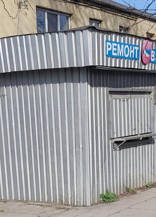 Кіоск для ремонту взуття.
