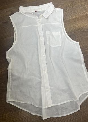 Біла жіноча блуза без рукавів від бренду h&m є стильним та універсальним елементом гардеробу. розмір m/l
